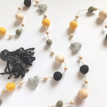Load image into Gallery viewer, Felt Ball and Wood Bead Garland Craft Kit | Black and Gold with Felted Wool Hearts
