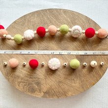 Load image into Gallery viewer, Felt Ball and Wood Bead Garland Craft Kit with Felted Wool Pink Peppermints| Holly Jolly Collection
